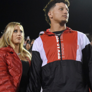 Patrick Mahomes, right, stands with his wife, Brittany Mahomes during his Ring of Honor ceremony