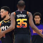 Phoenix Suns guard Devin Booker (1) and forward Kevin Durant (35) react against the Los Angeles Clippers during the second half at Intuit Dome.
