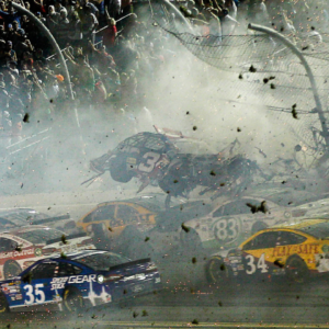 NASCAR Sprint Cup Series driver Austin Dillon car (3) crashes against the catch fence during the finish of the Coke Zero 400 at Daytona International Speedway.