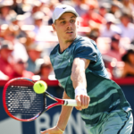 Denis Shapovalov (CAN) returns the ball to Brandon Nakashima (USA) (not pictured) in first round play at IGA Stadium.