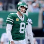 New York Jets quarterback Aaron Rodgers (8) reacts during the first quarter against the Indianapolis Colts at MetLife Stadium.