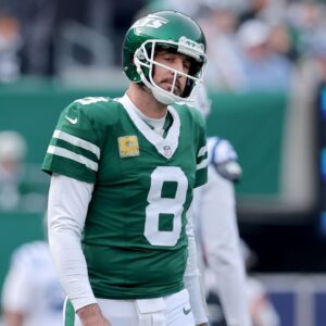New York Jets quarterback Aaron Rodgers (8) reacts during the first quarter against the Indianapolis Colts at MetLife Stadium.