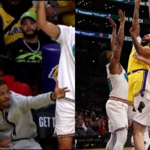 Los Angeles Lakers forward Anthony Davis (3) shoots the ball between Memphis Grizzlies guard Marcus Smart (36) and center Zach Edey (14) during the first quarter at Crypto.com Arena