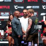 ; Jake Paul (right) faces off with Mike Tyson after their press conference at The Pavilion at Toyota Music Factory.