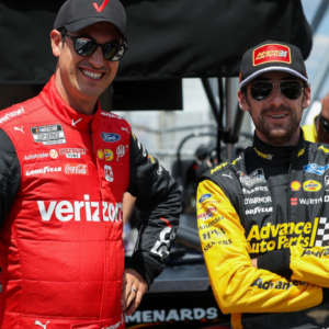 NASCAR Cup Series driver Joey Logano (left) and driver Ryan Blaney chat during practice and qualifying for the HighPoint.com 400 at Pocono Raceway.