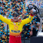 NASCAR Cup Series driver Joey Logano (22) celebrates after winning the 2024 NASCAR Cup Series championship and the NASCAR Cup Series Championship race at Phoenix Raceway.