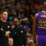Los Angeles Lakers head coach JJ Redick with forward LeBron James (23) against the Phoenix Suns at Footprint Center.
