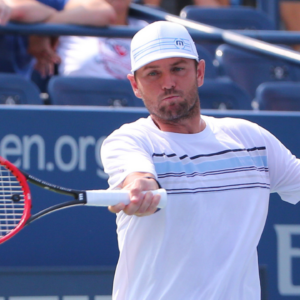 Mardy Fish of the United States returns a shot to Feliciano Lopez of Spain on day three of the 2015 U.S. Open tennis tournamen
