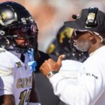 Oct 19, 2024; Tucson, Arizona, USA; Colorado Buffalos wide receiver Travis Hunter (12) with head coach Deion Sanders against the Arizona Wildcats at Arizona Stadium.