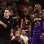 Los Angeles Lakers head coach JJ Redick with forward LeBron James (23) against the Phoenix Suns at Footprint Center.
