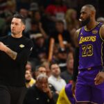 Los Angeles Lakers head coach JJ Redick with forward LeBron James (23) against the Phoenix Suns at Footprint Center.