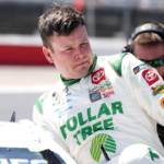 NASCAR Cup Series driver Erik Jones (43) climbs from his car during qualifying for the Cook Out Southern 500 at Darlington Raceway.