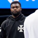 New Orleans Pelicans forward Zion Williamson watches during a timeout against the Denver Nuggets at Smoothie King Center