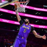 Los Angeles Lakers forward Anthony Davis (3) scores a basket against the Utah Jazz during the first half at Crypto.com Arena