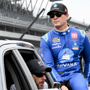 NASCAR Cup Series driver Jimmie Johnson (84) rides around the track during driver introductions ahead of the Brickyard 400, Sunday, July 21, 2024, at Indianapolis Motor Speedway.