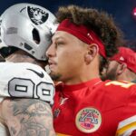 Nov 29, 2024; Kansas City, Missouri, USA; Kansas City Chiefs quarterback Patrick Mahomes (15) greets Las Vegas Raiders defensive end Maxx Crosby (98) after the game at GEHA Field at Arrowhead Stadium.