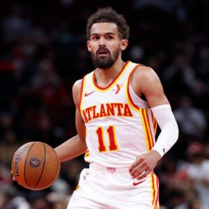 Atlanta Hawks guard Trae Young (11) brings the ball up court against the Chicago Bulls during the second half at United Center