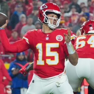 Nov 4, 2024; Kansas City, Missouri, USA; Kansas City Chiefs quarterback Patrick Mahomes (15) throws a pass against the Tampa Bay Buccaneers during the first half at GEHA Field at Arrowhead Stadium.