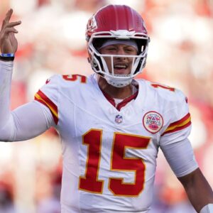 Kansas City Chiefs quarterback Patrick Mahomes (15) reacts after the Chiefs scored a touchdown against the San Francisco 49ers in the fourth quarter at Levi's Stadium.