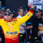 NASCAR Cup Series driver Joey Logano (22) celebrates after winning the 2024 NASCAR Cup Series championship and the NASCAR Cup Series Championship race at Phoenix Raceway.