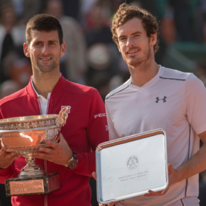 Novak Djokovic (SRB) and Andy Murray (GBR) pose with their trophies at the presentation on day 15 of the 2016 French Open.