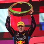 Max Verstappen of Red Bull Racing RB20 celebrates his victory on the podium during the Formula 1 Grand Prix of Brazil