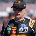 NASCAR Cup Series driver Kevin Harvick(4) walks down pit road during qualifying for the GEICO 500 at Talladega Superspeedway.
