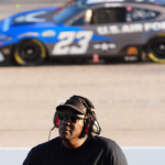 NASCAR Cup Series Team 23XI owner Michael Jordan watches a video board as NASCAR Cup Series driver Bubba Wallace (23) races during the Cook Out Southern 500 at Darlington Raceway.