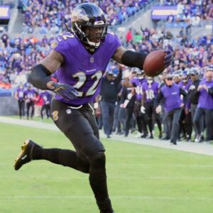 Baltimore Ravens running back Derrick Henry (22) scores a third quarter touchdown against the Denver Broncos at M&T Bank Stadium.