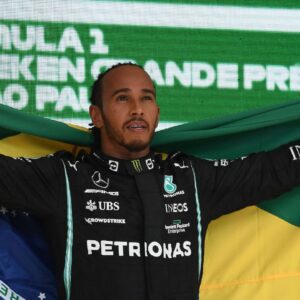 Lewis Hamilton of Great Britain and team Mercedes with the Brazilian flag to honor his hero Ayrton Senna
