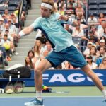 Andrey Rublev plays a shot at the US Open 2024