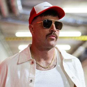 Kansas City Chiefs tight end Travis Kelce (87) arrives prior to a a game against the Baltimore Ravens at GEHA Field at Arrowhead Stadium.