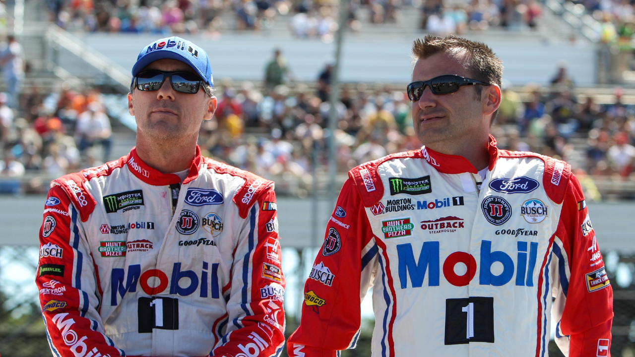 NASCAR Cup Series driver Kevin Harvick (left) sits on the pit wall with crew chief Rodney Childers (right) prior to the Overton's 400 at Pocono Raceway.
