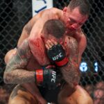 Dustin Poirier (red gloves) and Michael Chandler (blue gloves) during UFC 281 at Madison Square Garden.