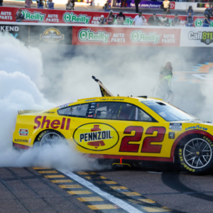 NASCAR Cup Series driver Joey Logano (22) celebrates after winning the 2024 NASCAR Cup Series championship and the NASCAR Cup Series Championship race at Phoenix Raceway.