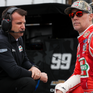 Former NASCAR Cup Series driver Kevin Harvick (right) talks with his crew chief Rodney Childers (left) on pit road during practice and qualifying for the Wurth 400 at Dover Motor Speedway.