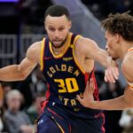 Golden State Warriors guard Stephen Curry (30) dribbles the basketball against Atlanta Hawks guard Dyson Daniels (5) during the fourth quarter at Chase Center.