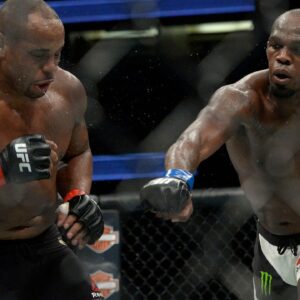 Jon Jones lands a hit against Daniel Cormier during UFC 214 at Honda Center.