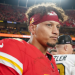 Kansas City Chiefs quarterback Patrick Mahomes (15) on field against the New Orleans Saints after the game at GEHA Field at Arrowhead Stadium.