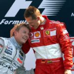 GP Monza 2006: Sieger Michael Schumacher (Deutschland Ferrari, re.) umarmt den Zweiten Kimi Räikkönen (Finnland McLaren Mercedes)