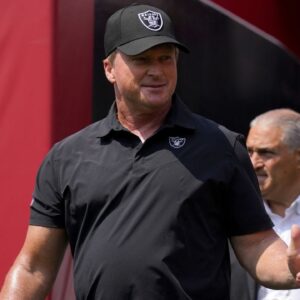 Las Vegas Raiders head coach Jon Gruden walks onto the field before the start of the game against the San Francisco 49ers at Levi's Stadium.