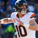 Denver Broncos quarterback Bo Nix (10) throws during the first quarter against the Baltimore Ravens at M&T Bank Stadium.
