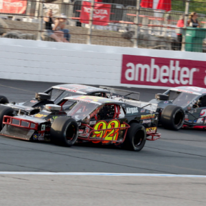 Anthony Nocella ( 92 Nocella Paving K+D Associates, Air Gas Modified), Eric Goodale ( 58 GAF Roofing Modified), and Kyle Bonsignore ( 22 Chalew Performance MTT Muns Auto Modified) in turn 4 during the NASCAR, Motorsport, USA Whelen Modified Tour Whelen Manufactured in America 100 race on July 16, 2022 at the New Hampshire Motor Speedway in Loudon, New Hampshire.(Photo by Malcolm Hope Icon Sportswire) AUTO: JUL 16 NASCAR Whelen Modified Tour.