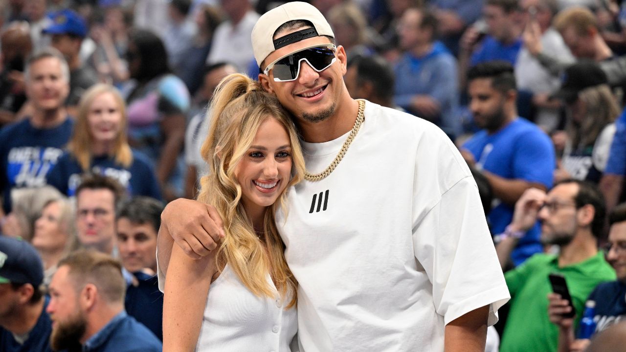 Kansas City Chiefs quarterback Patrick Mahomes and Brittany Mahomes pose in the first half between the Dallas Mavericks and the Minnesota Timberwolves during game three of the western conference finals for the 2024 NBA playoffs at American Airlines Center.