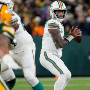Miami Dolphins quarterback Tua Tagovailoa (1) looks to throw a pass during the second quarter against the Green Bay Packers at Lambeau Field.