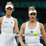 Gabriela Dabrowski (CAN)(R) and Erin Routliffe (NZL)(L) on court between points against Taylor Townsend (USA) and Katerina Siniakova (CZE)(both not pictured) in the ladies' doubles final of The Championships Wimbledon 2024