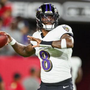Baltimore Ravens quarterback Lamar Jackson (8) warms up before a game against the Tampa Bay Buccaneers at Raymond James Stadium.
