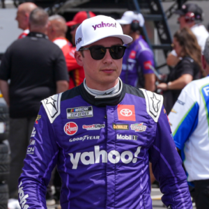 NASCAR Cup Series driver Christopher Bell (20) walks down pit road to see his winning pit crew after the crew challenge during qualifying at North Wilkesboro Speedway.