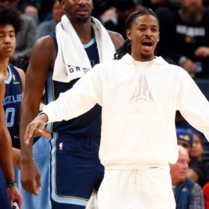 Memphis Grizzlies guard Ja Morant reacts from the bench during the first half against the Philadelphia 76ers at FedExForum.