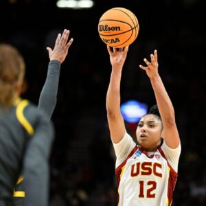 USC Trojans guard JuJu Watkins (12) shoots a jump shot during the second half against Baylor Lady Bears guard Darianna Littlepage-Buggs (5) in the semifinals of the Portland Regional of the 2024 NCAA Tournament at the Moda Center.